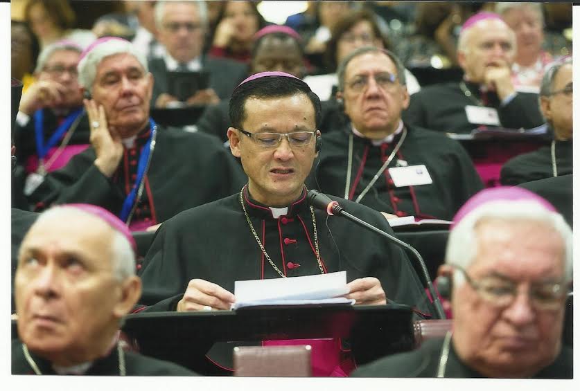 Abp Wong reads out his intervention at the synod.