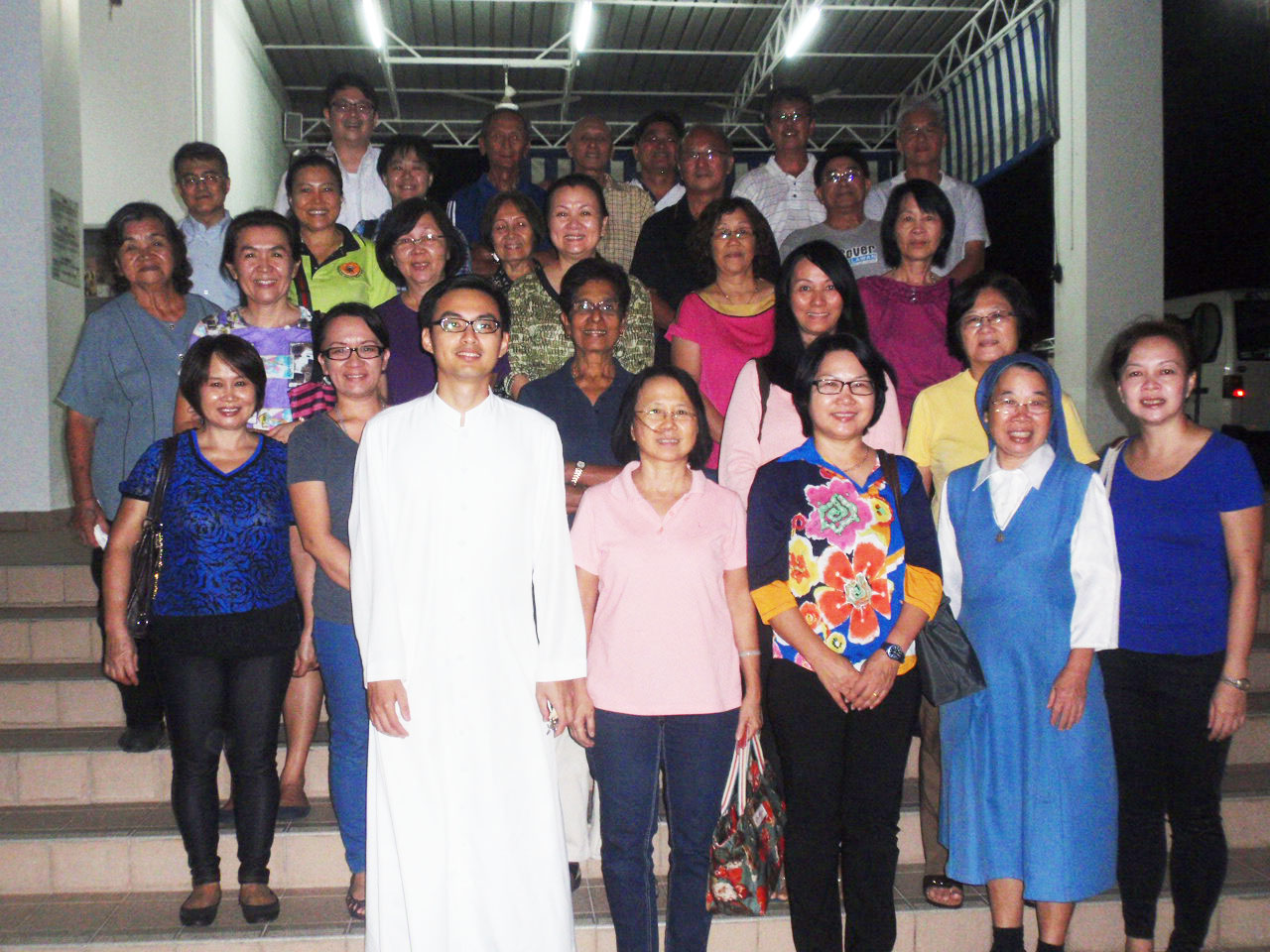 The group who prepared themselves for the feast day pose for remembrance.